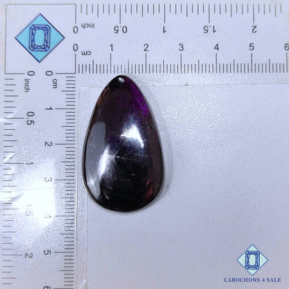 Cabujones de pera de piedra preciosa purpurita natural de 38 x 23 x 7 mm de Namibia, disponibles para la venta.