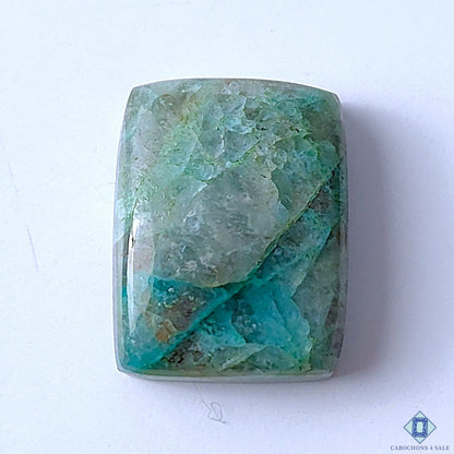 Cabochons4sale rectangular Quantum Quattro cabochon gemstone featuring natural blue and green opaque patterns.