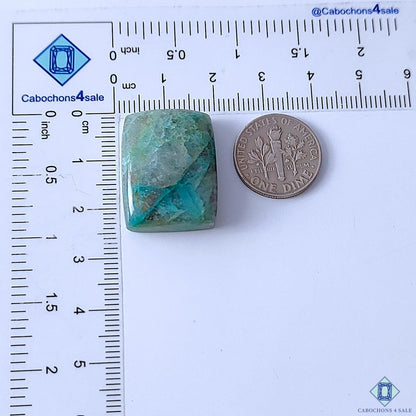 Cabochons4sale rectangle Quantum Quattro cabochon with blue and green patterns next to a US dime for scale