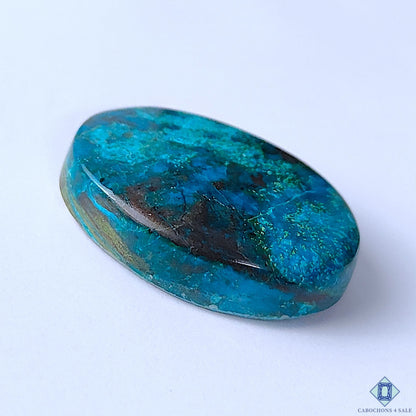 Cabochons4sale oval Quantum Quattro cabochon gemstone with vibrant blue and dark mineral inclusions