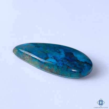 Cabochons4sale natural pear-shaped Quantum Quattro cabochon gemstone with vibrant blue and green opaque patterns.