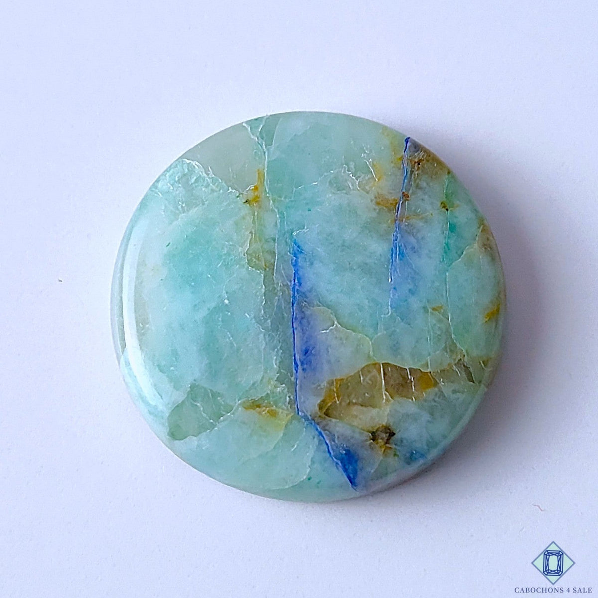 Cabochons4sale round Quantum Quattro gemstone cabochon with blue and green natural mineral patterns, 32x6mm.