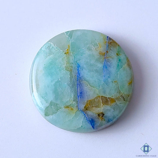 Cabochons4sale round Quantum Quattro gemstone cabochon with blue and green natural mineral patterns, 32x6mm.