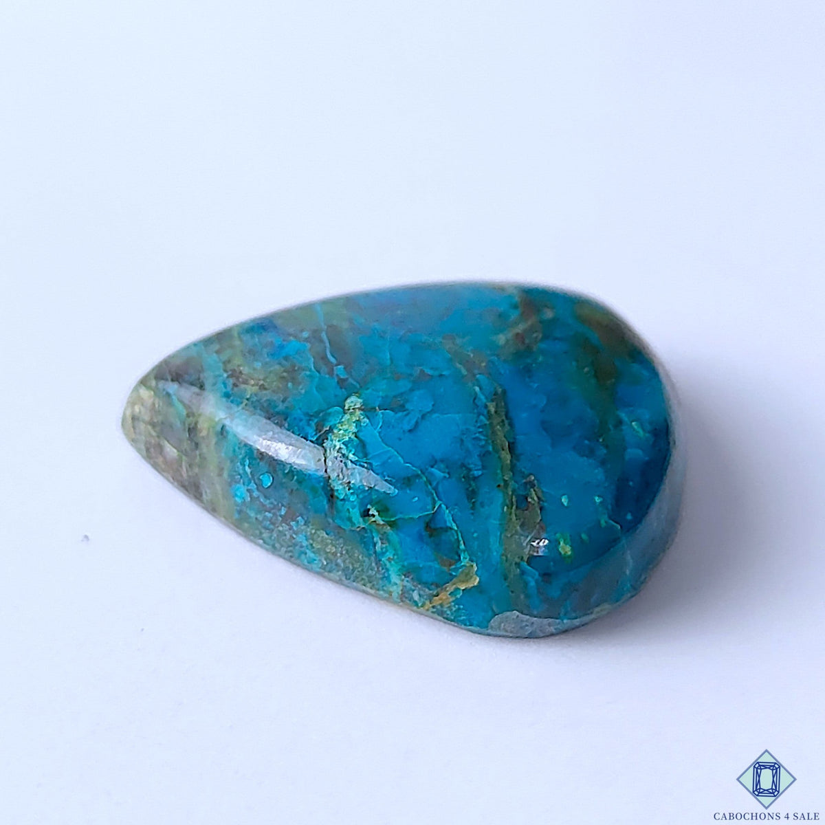 Cabochons4sale pear-shaped Quantum Quattro cabochon with vibrant blue and green opaque gemstone patterns.