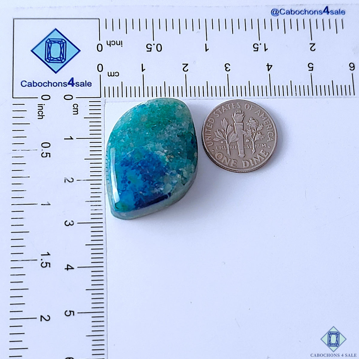 Cabochons4sale natural opaque blue and green Quantum Quattro fancy cabochon gemstone next to a US dime for scale