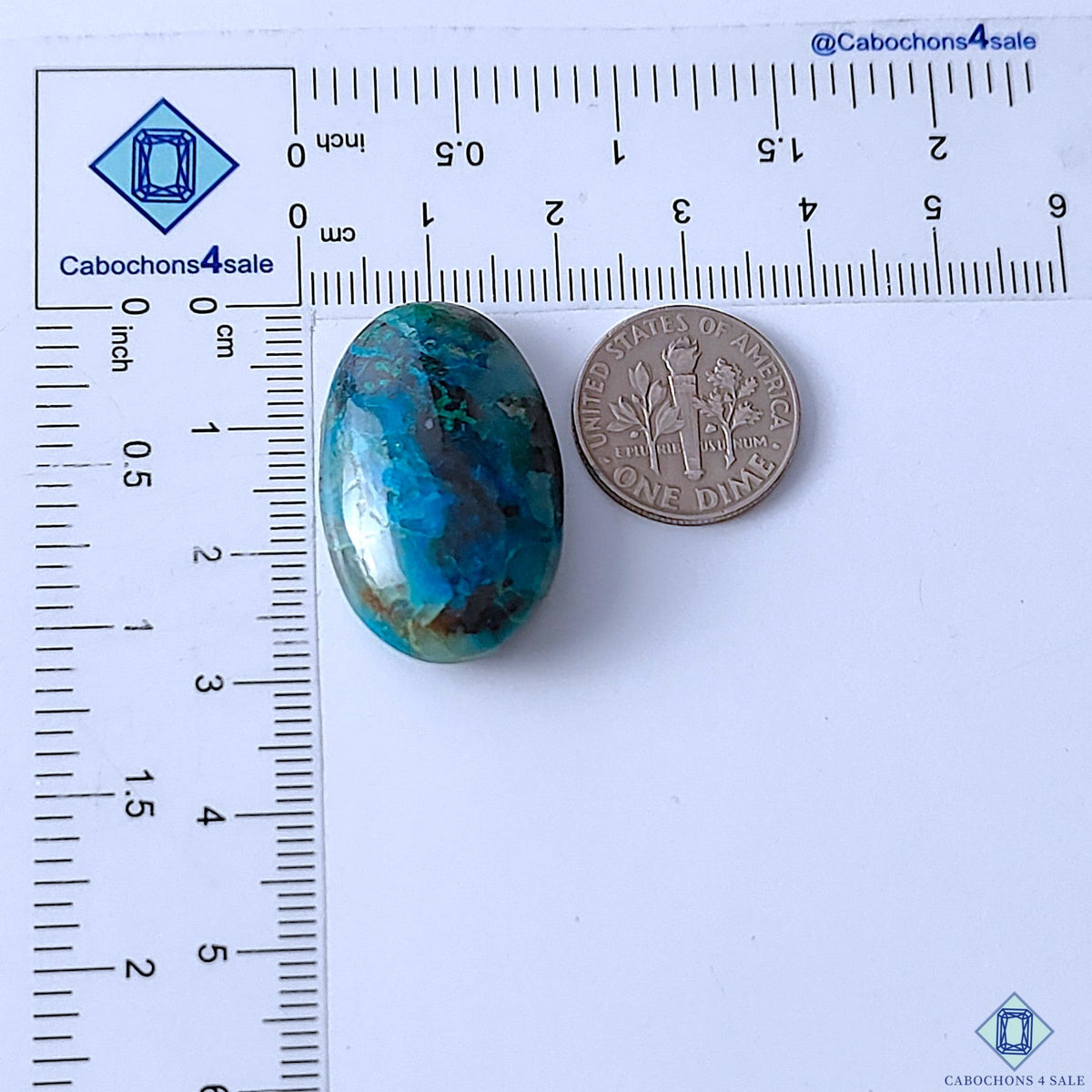 Cabochons4sale oval Quantum Quattro cabochon gemstone with vibrant blue and green patterns, 29x18x8mm size.