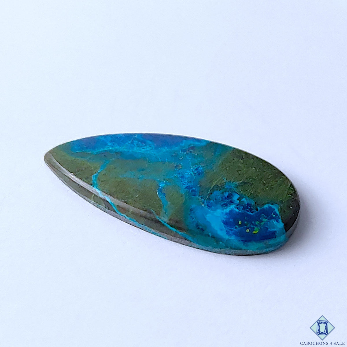 Cabochons4sale pear-shaped Quantum Quattro cabochon featuring vibrant blue and green natural stone patterns.