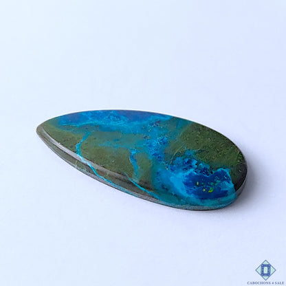Cabochons4sale pear-shaped Quantum Quattro cabochon featuring vibrant blue and green natural stone patterns.