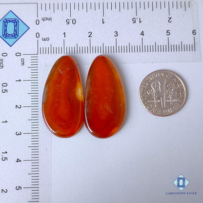 Pares de piedras preciosas de ónix rojo natural en forma de pera de 31 x 15 x 3 mm de México, disponibles para la venta.
