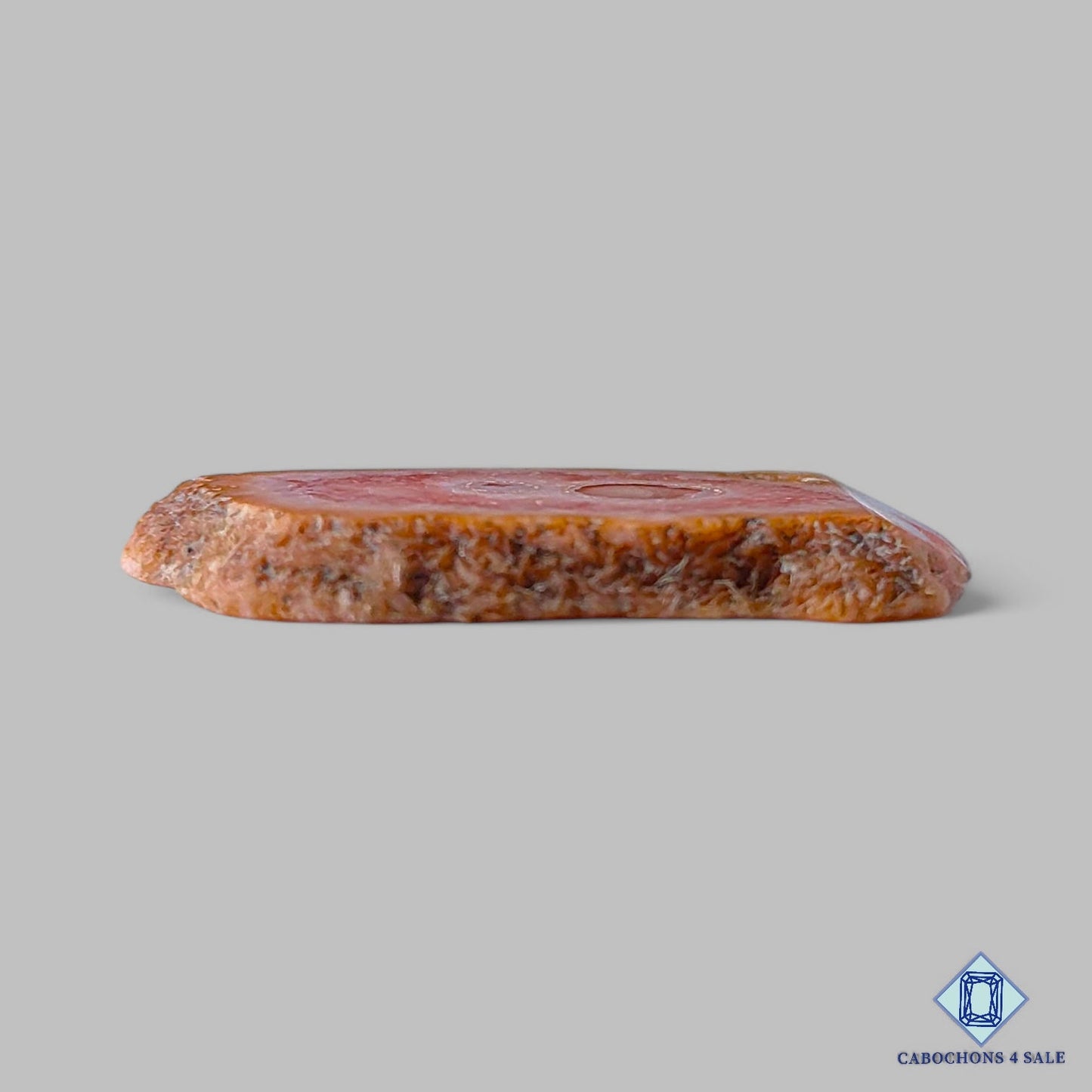 Piedra preciosa natural de rodocrosita drusa de lujo de 34 x 19 x 3 mm procedente de Argentina, disponible para la venta.