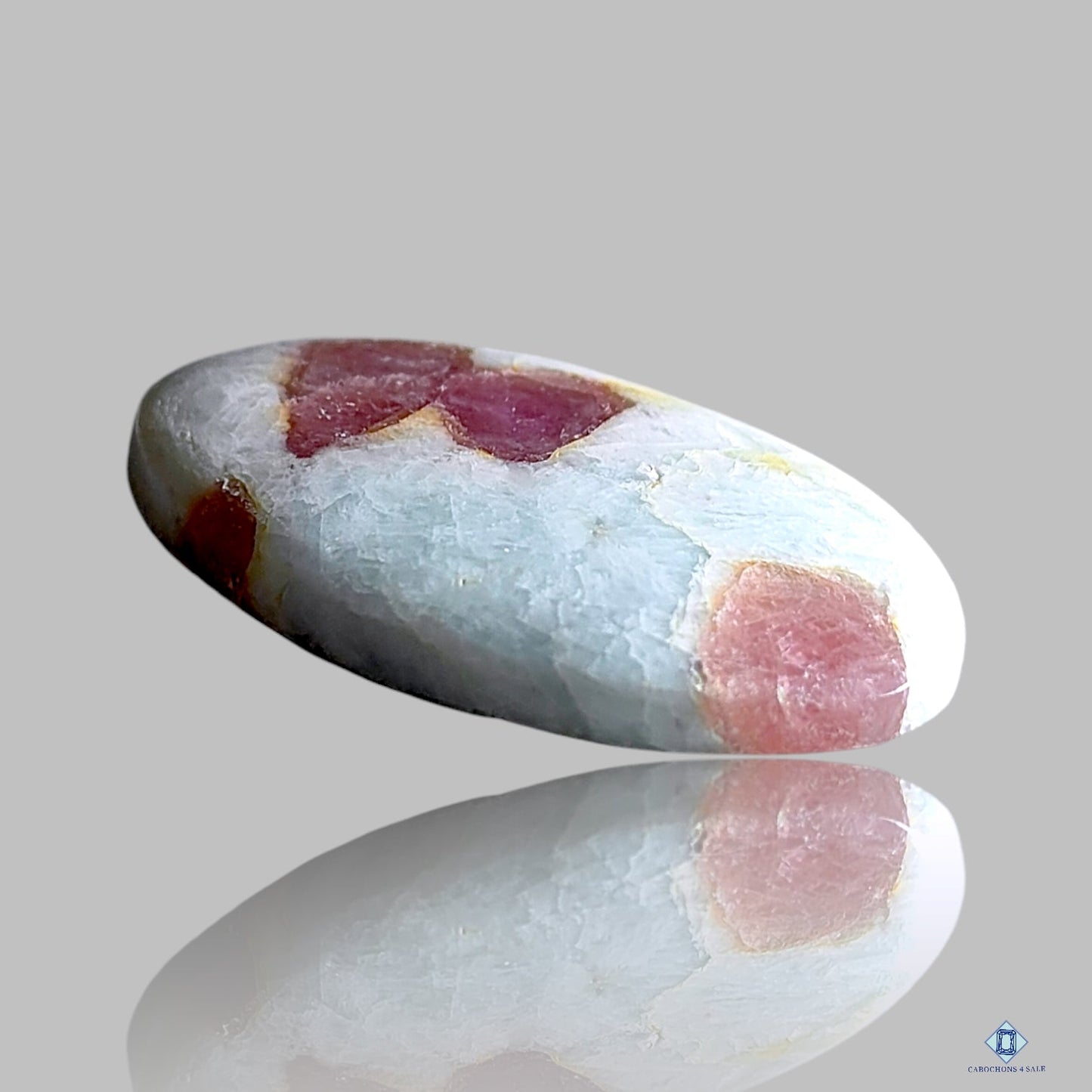 Pink Tourmaline In Quartz Oval Cabochons