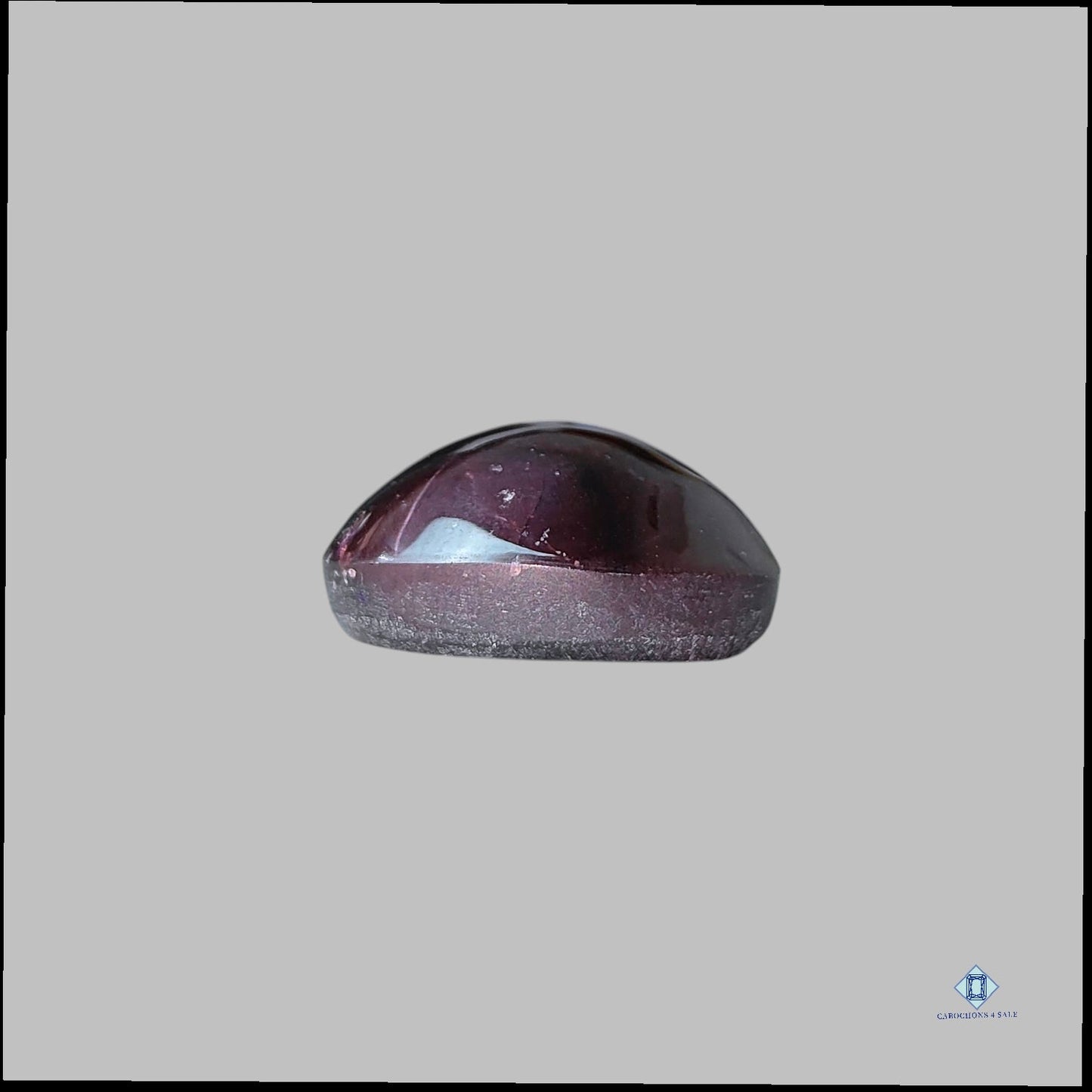 Cabujón ovalado de granate estrella 