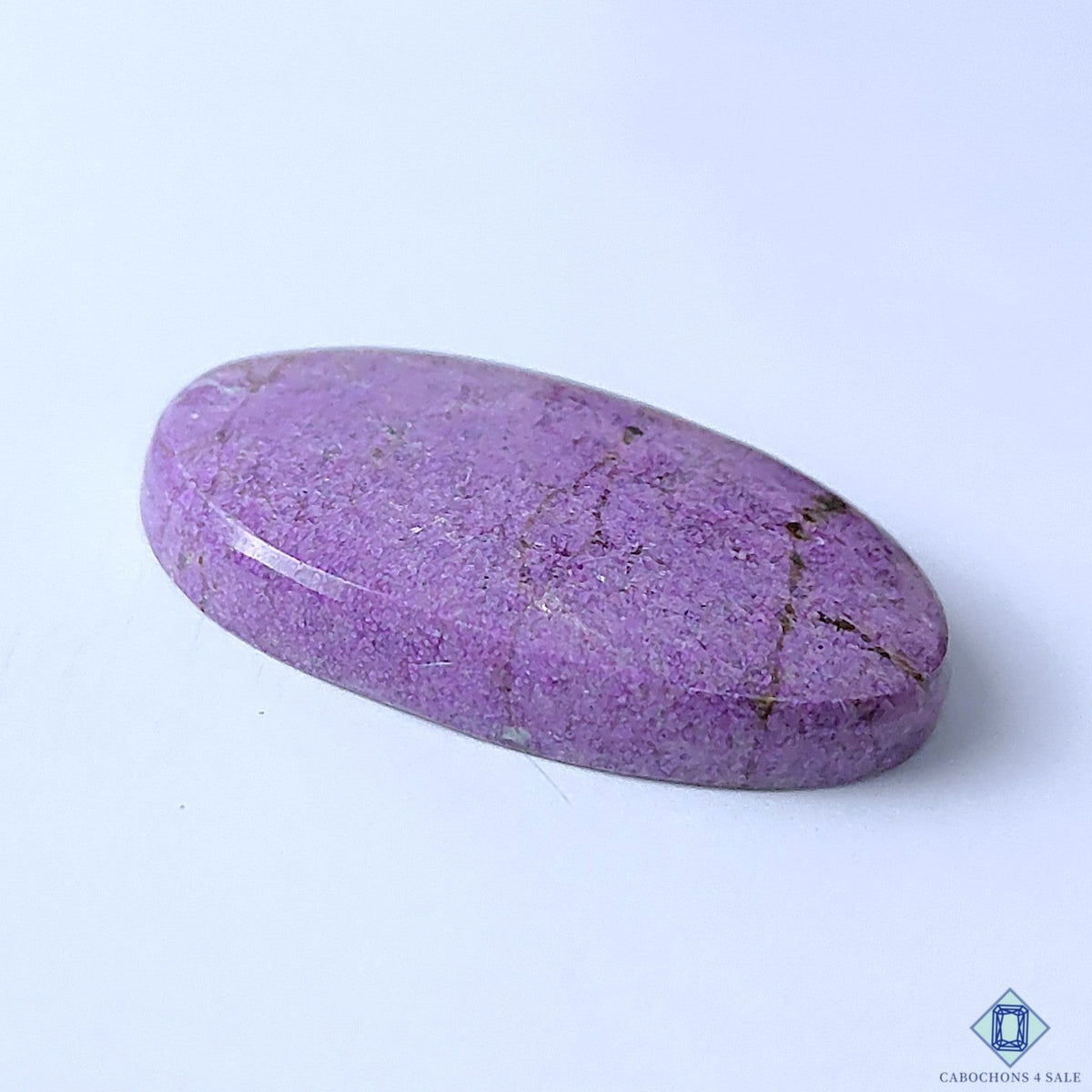 Cabochons4sale oval purple stichtite gemstone cabochon with natural opaque texture and 38x24x7mm dimensions