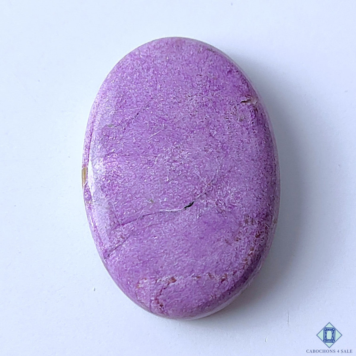 Cabochons4sale oval stichtite gemstone with a smooth purple opaque surface, 33x23x7mm size for jewellery making.