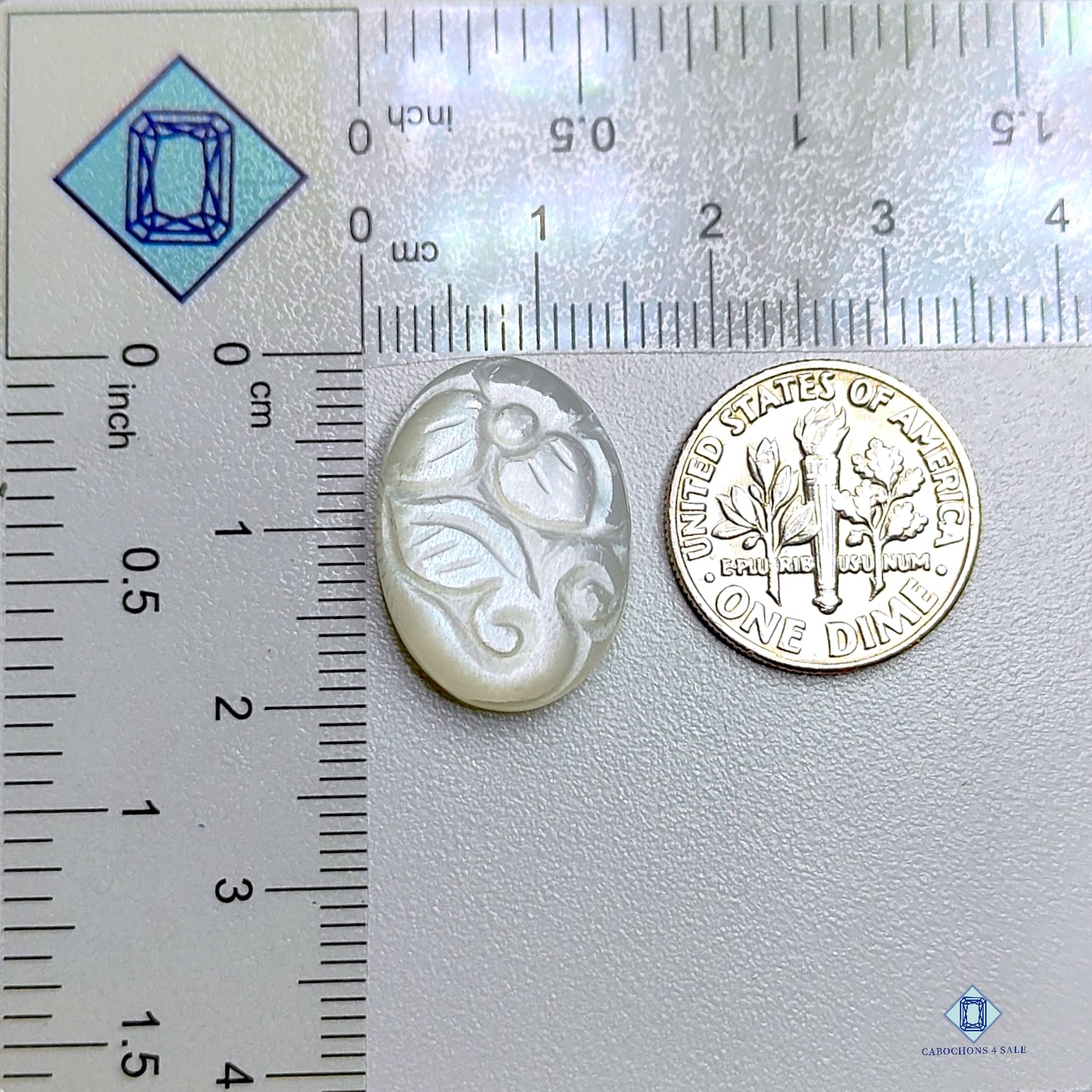 0-White_Moonstone-c4sw2335-2-Oval-White-15_20mm-Carvings-Opaque-0