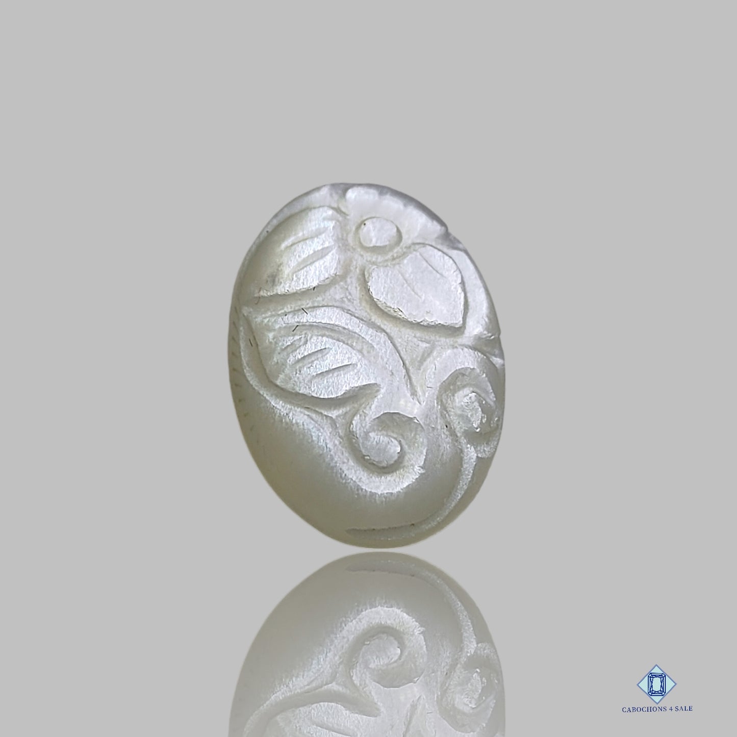 0-White_Moonstone-c4sw2335-3-Oval-White-15_20mm-Carvings-Opaque-0