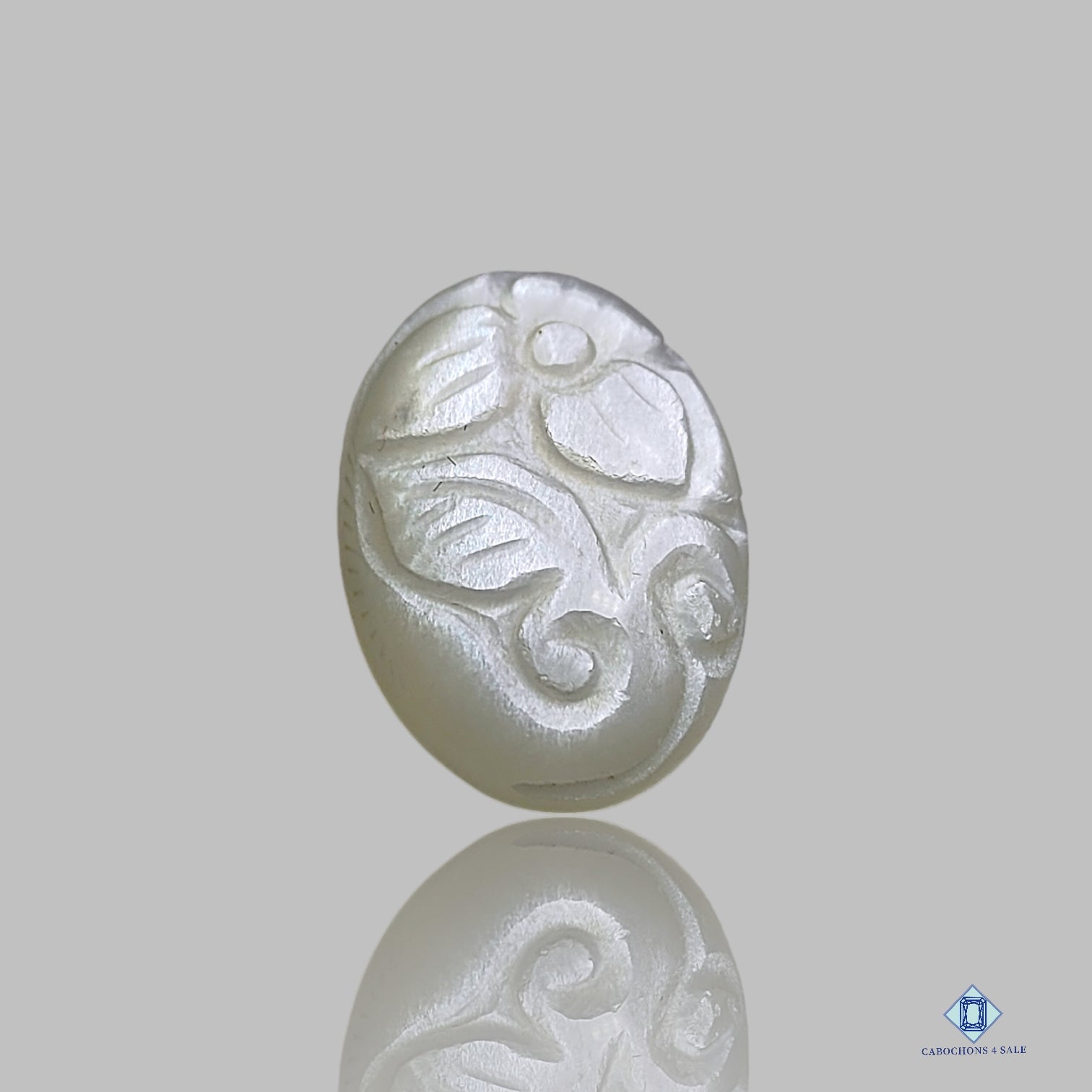 0-White_Moonstone-c4sw2335-3-Oval-White-15_20mm-Carvings-Opaque-0