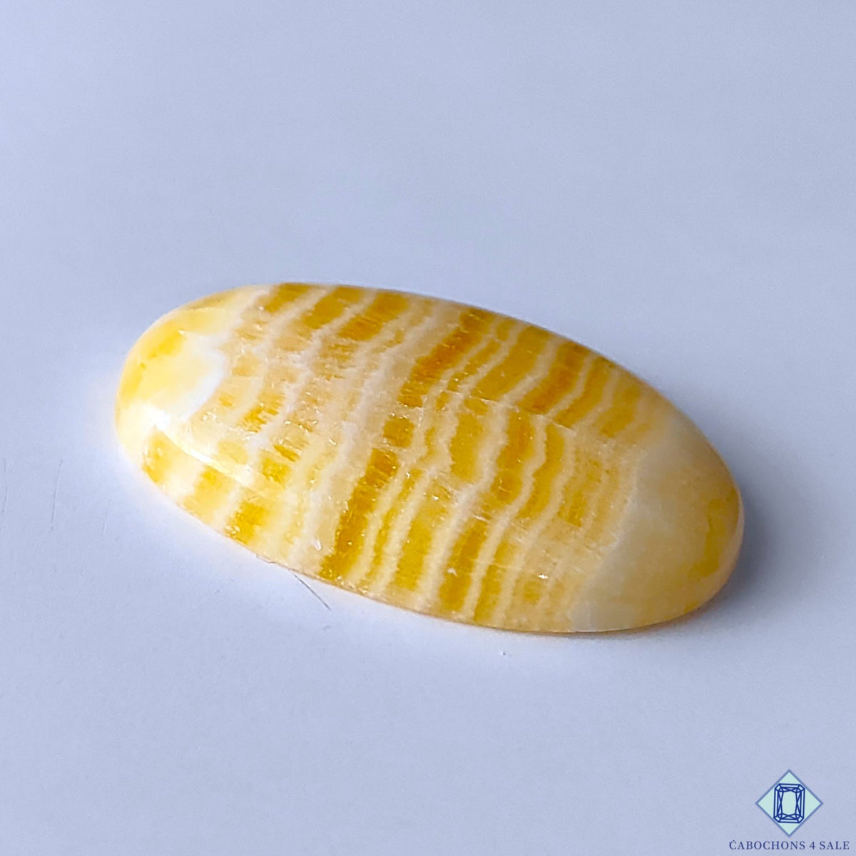 0-Yellow_Calcite-C4sw22927-3-Oval-Yellow-mm-Cabochons-Opaque-0