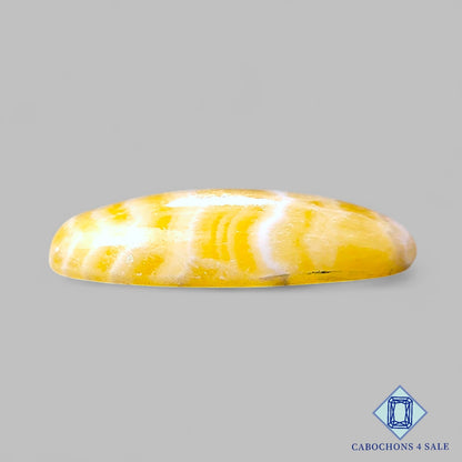 Cabujones ovalados de calcita amarilla natural de 37 x 23 x 7 mm, procedentes de México, disponibles para la venta.