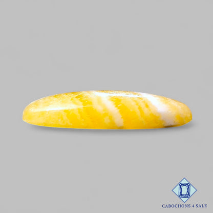 Cabujones ovalados de calcita amarilla natural de 42 x 22 x 8 mm, de México, disponibles para la venta.