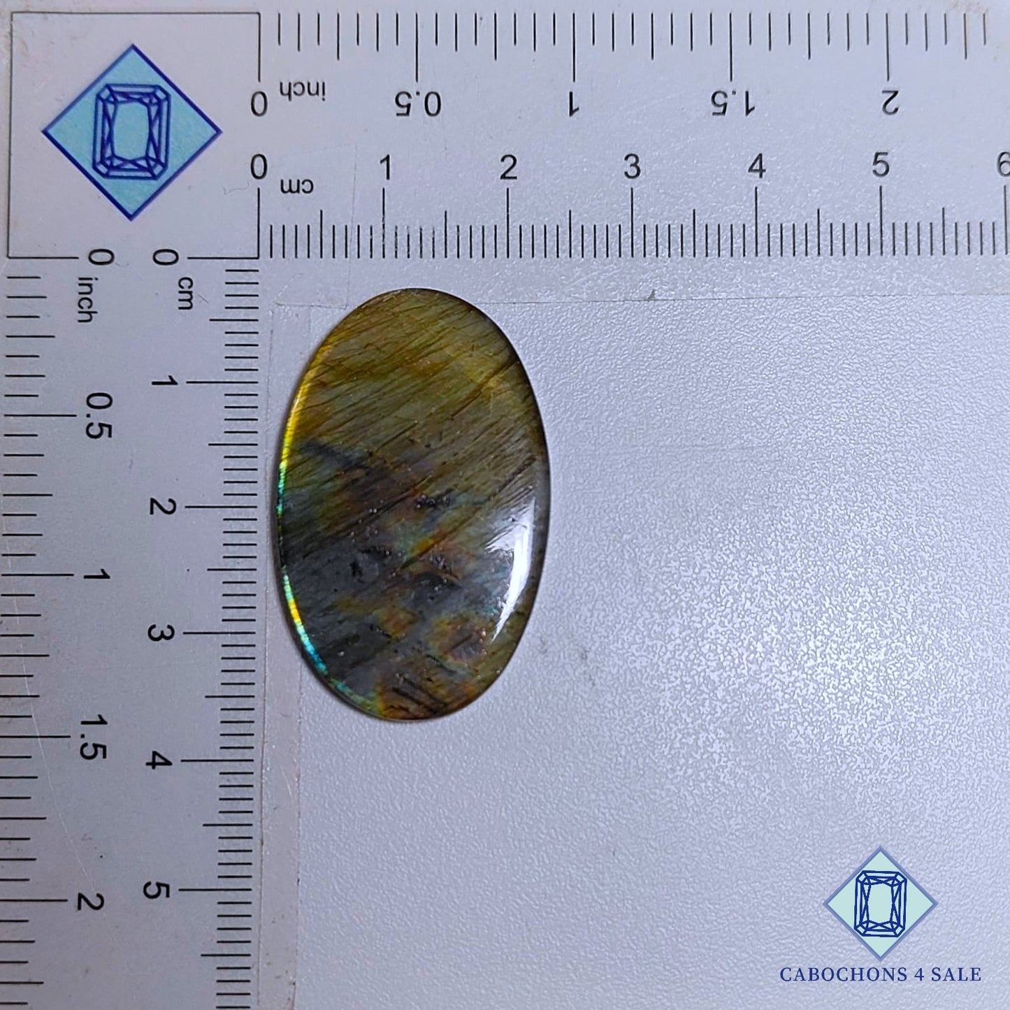 Cabujones ovalados de labradorita amarilla natural de 34 x 21 x 4 mm de Madagascar, disponibles para la venta.