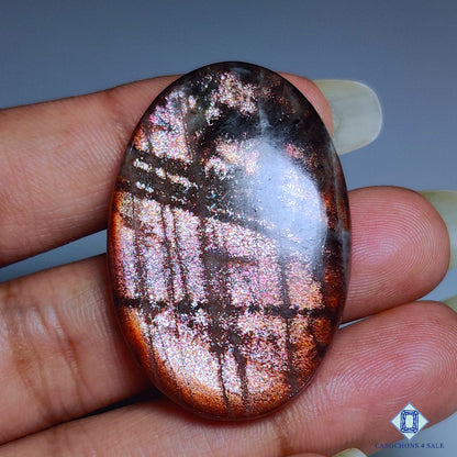 Cabujones ovalados de piedra solar morada de 38 x 26 x 6 mm