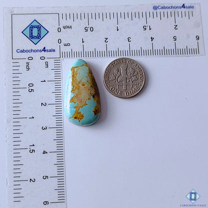 cabochons4sale, blue and yellow turquoise pear cabochons featuring distinctive natural matrix markings, warm mineral tones and a smooth polished finish held between fingers