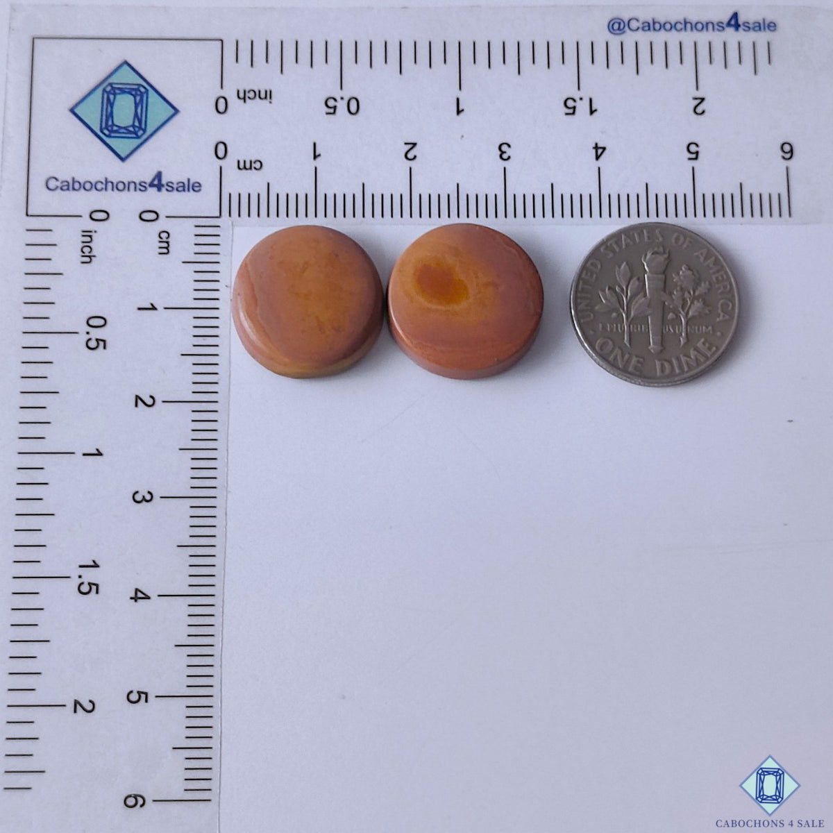 cabochons4sale, brown imperial round gemstone cabochons featuring warm natural color, organic stone texture and refined polish held between fingers