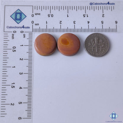 cabochons4sale, brown imperial round gemstone cabochons featuring warm natural color, organic stone texture and refined polish held between fingers