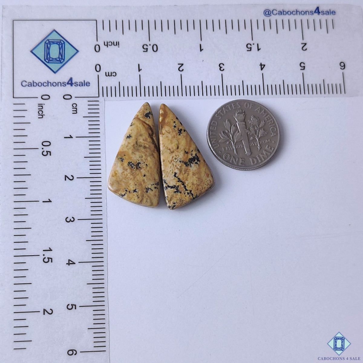 cabochons4sale, brown picture jasper fancy gemstone cabochons featuring artistic landscape-like markings and a smooth polished finish held between fingers