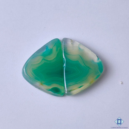 cabochons4sale, natural green banded agate fancy cabochons with flowing layers, translucent tones and polished gemstone surfaces held between fingers