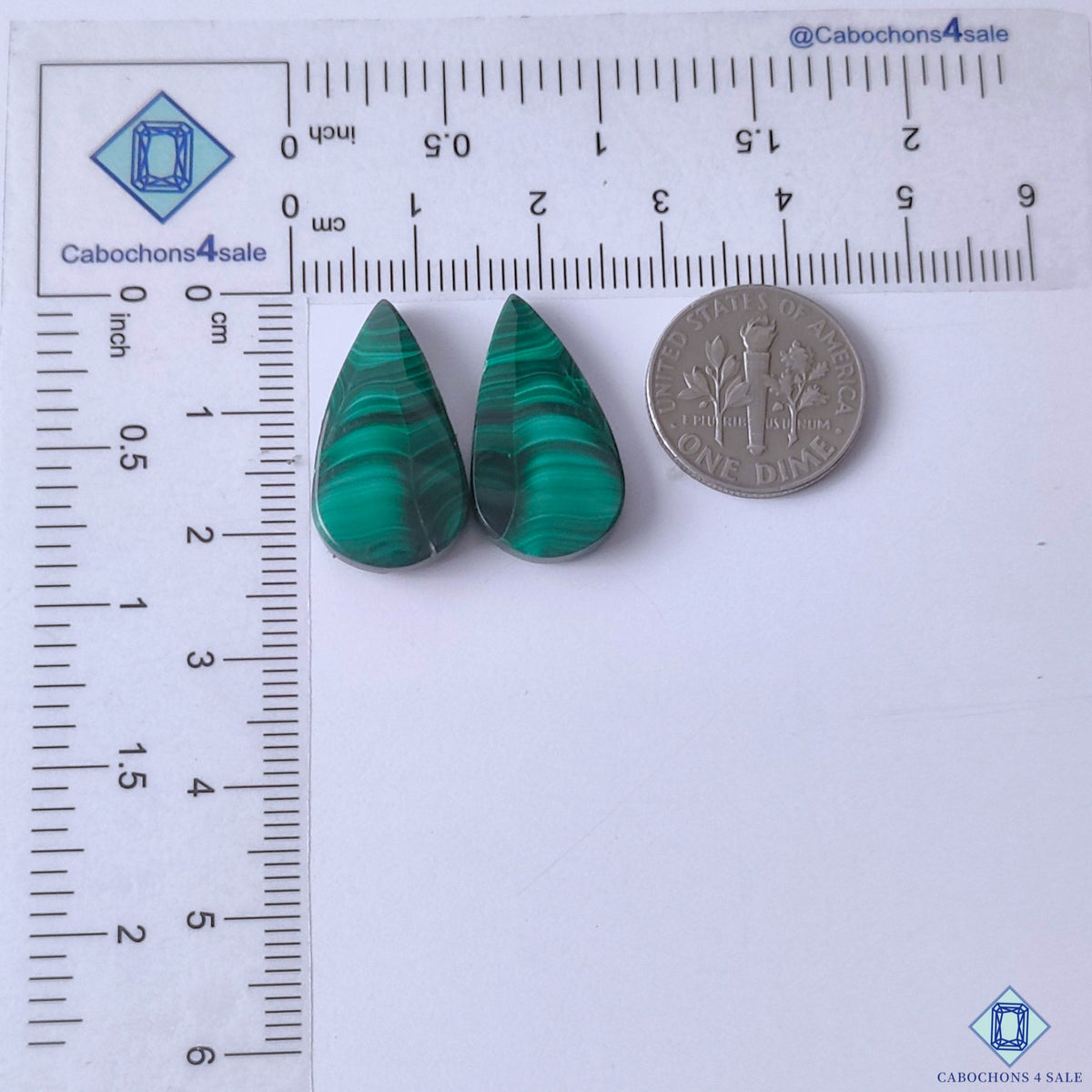 cabochons4sale, vibrant green malachite pear gemstone cabochons featuring elegant swirling mineral bands and distinctive natural stone character held between fingers