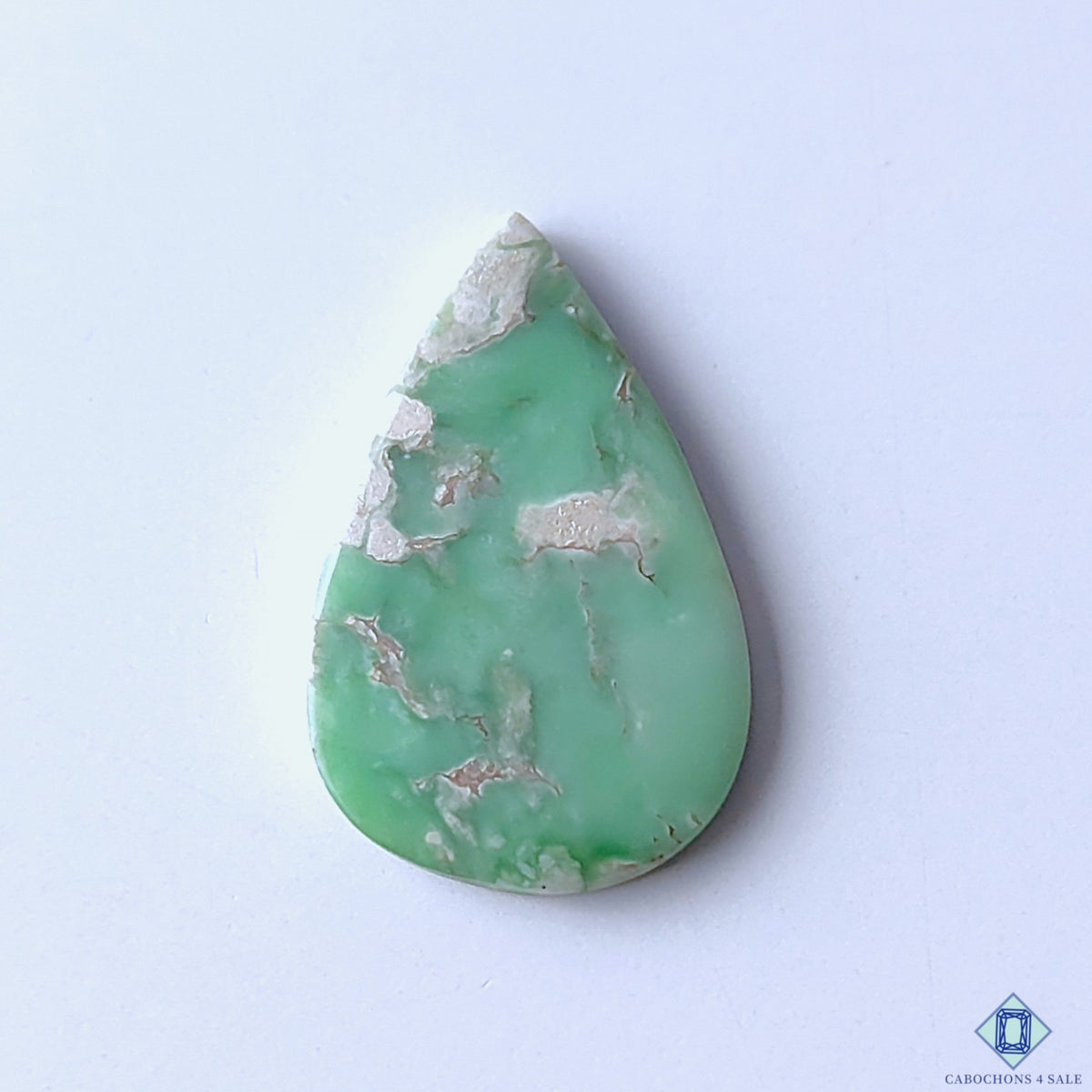 cabochons4sale, natural green variscite pear cabochons with soft botanical-style markings, subtle color variation and smooth polished gemstone surfaces held between fingers