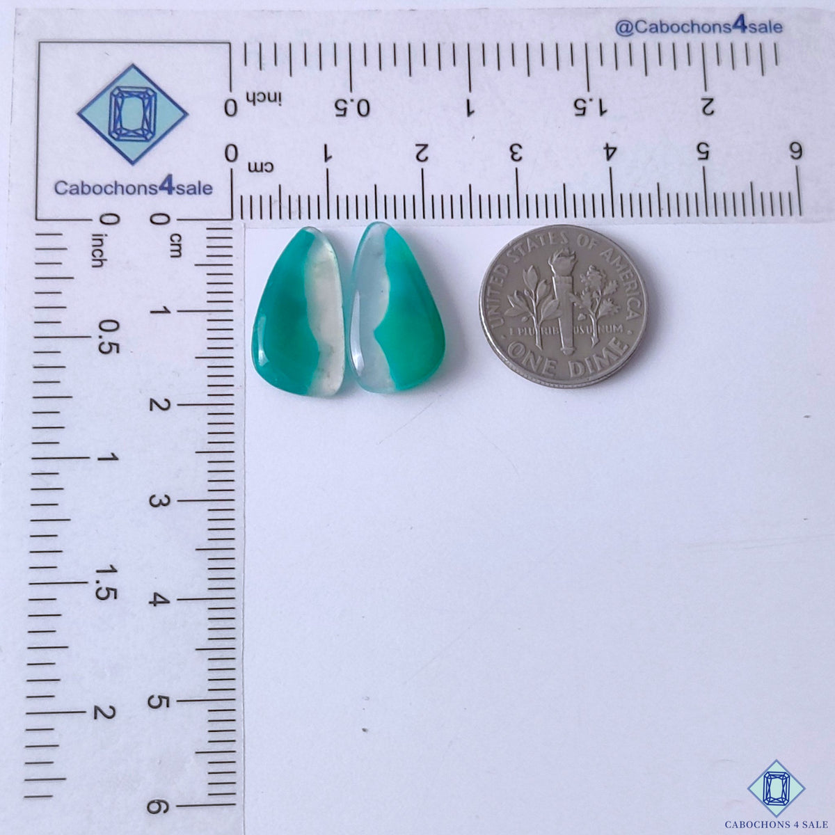 cabochons4sale, natural green and white green banded agate fancy cabochons featuring curved banding, organic striping and polished gemstone surfaces held between fingers