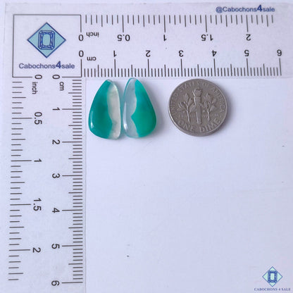 cabochons4sale, natural green and white green banded agate fancy cabochons featuring curved banding, organic striping and polished gemstone surfaces held between fingers