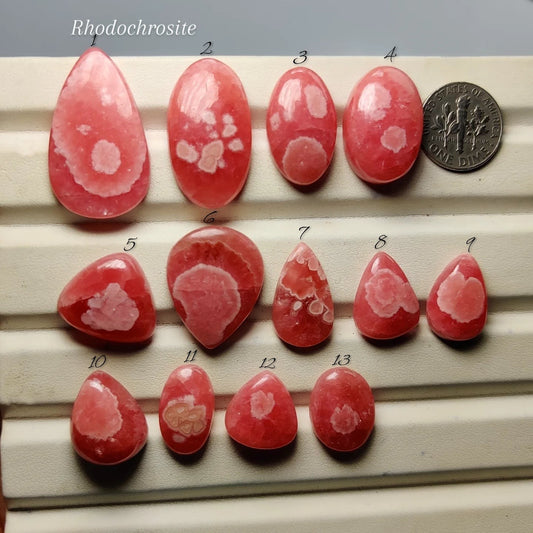 Cabochons4sale collection of natural pink rhodochrosite cabochons with unique white banded patterns for jewellery making
