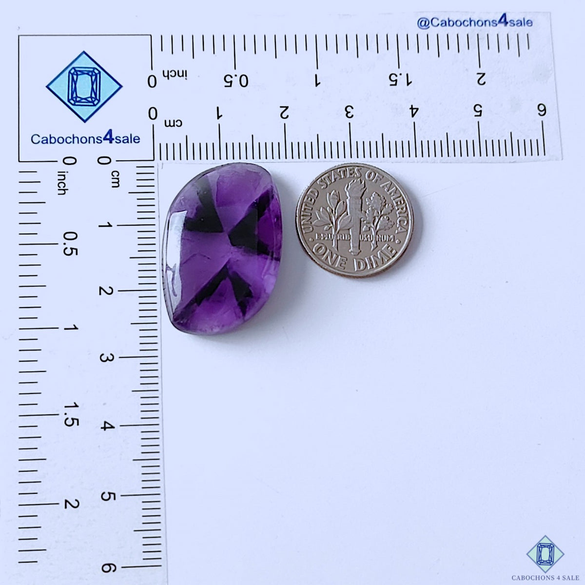 cabochons4sale, natural purple trapiche amethyst fancy cabochons showcasing geometric internal patterns, violet color depth and unique quartz character held between fingers