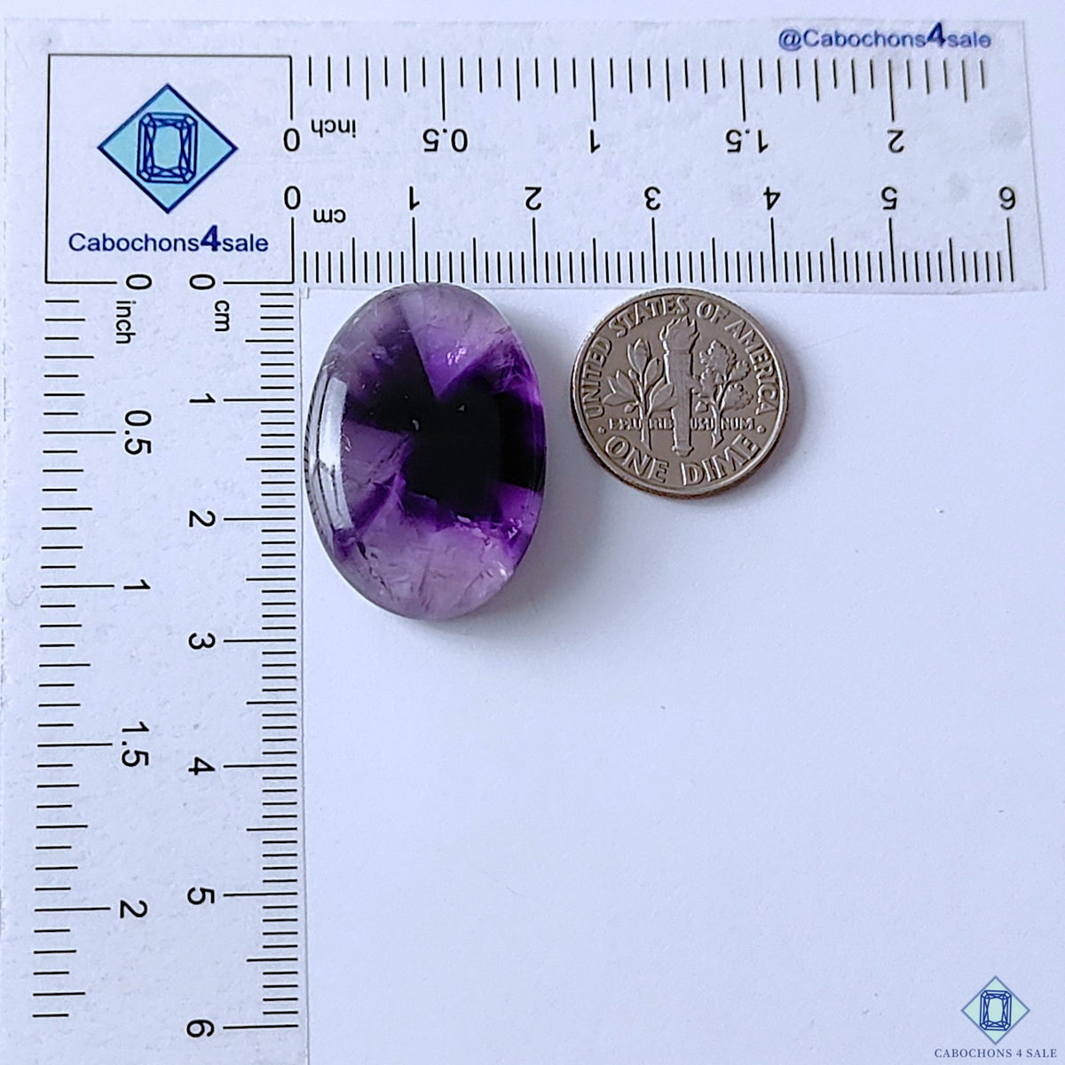 cabochons4sale, purple trapiche amethyst oval cabochons showcasing unique geometric formations, violet color depth and natural quartz inclusions held between fingers