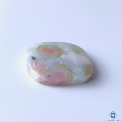cabochons4sale, polished rectangle watermelon tourmaline quartz cabochons featuring contrasting pink and green tones, distinctive natural zoning and unique gemstone character held between fingers