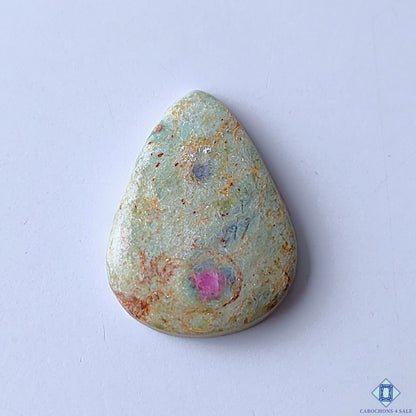 cabochons4sale, ruby fuchsite pear cabochons in green and pink shades with vibrant ruby inclusions, natural mineral textures and polished surfaces held between fingers