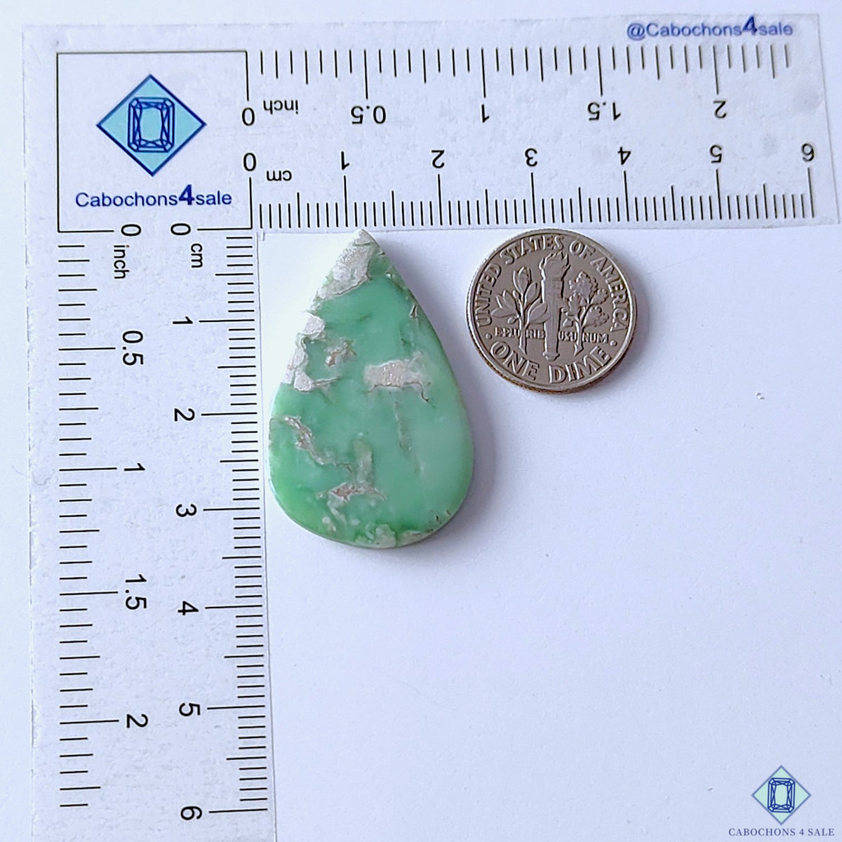 cabochons4sale, polished green variscite pear cabochons showcasing organic matrix patterns, earthy mineral details and rich natural green coloration held between fingers