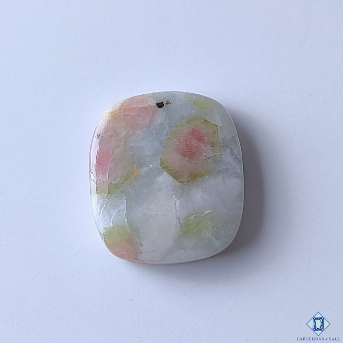 cabochons4sale, watermelon tourmaline quartz rectangle cabochons in green and pink shades with natural color zoning and polished gemstone surfaces held between fingers